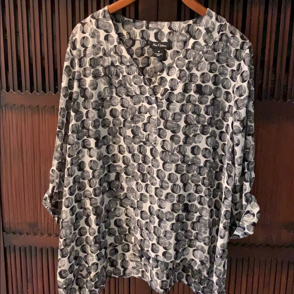 Women’s top. Sheer and loose. By Nue Options.